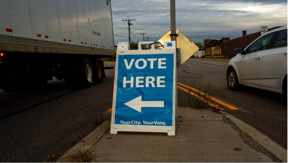 A voting sign in Minneapolis signals the arrival of a new election season (AP Photo/Nicole Neri)