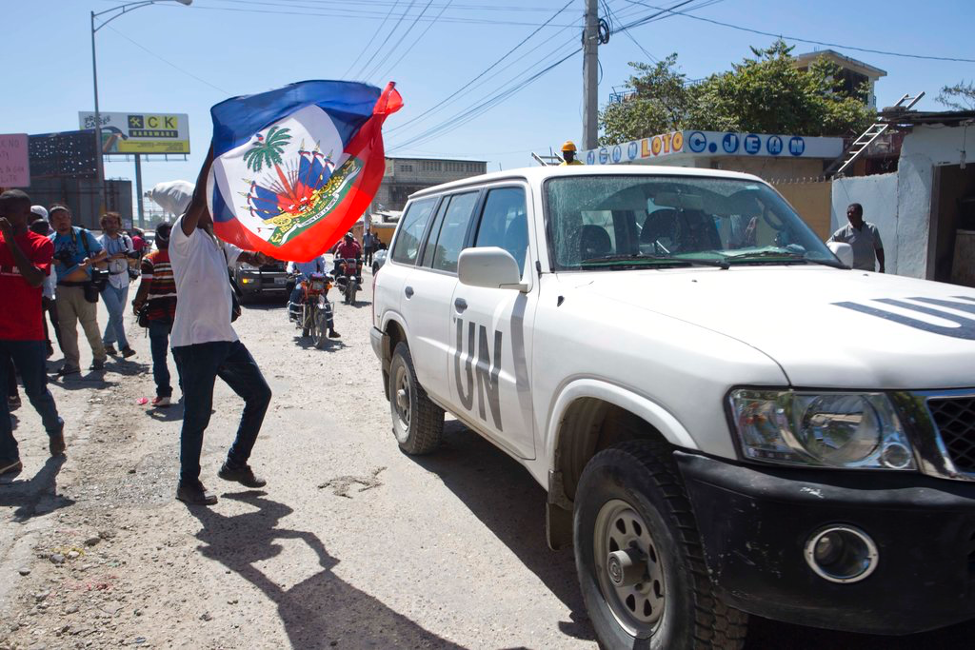 Haitians protest a United Nations (UN) delegation outside UN headquarters in Port-au-Prince, Haiti, Thursday, June 22, 2017. (AP Photo/Dieu Nalio Chery)