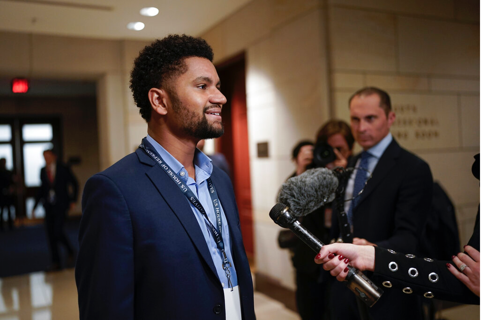 Rep.-elect Maxwell Frost, D-Fla., speaks with reporters as newly-elected members of the House of Representatives arrive at the Capitol for an orientation program in Washington, Monday, Nov. 14, 2022 (AP Photo/J. Scott Applewhite) 