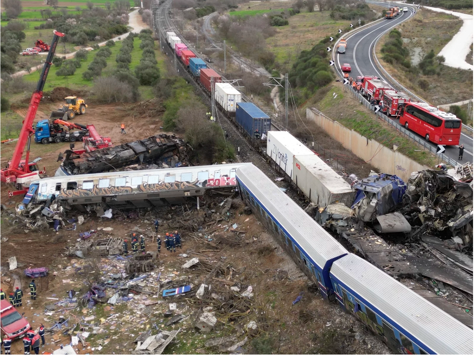 A crane, firefighters and rescuers operate after a collision in Tempe near Larissa city, Greece, Wednesday, March 1, 2023.Vaggelis Kousioras/AP
