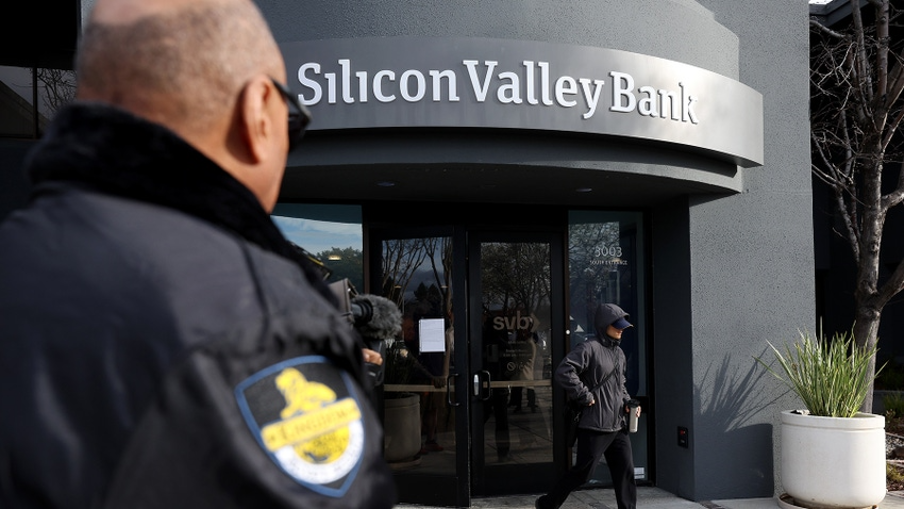 A security guard stands outside a Silicon Valley Bank location. Silicon Valley Bank’s failure was the second largest bank failure of all time, behind only Washington Mutual’s collapse in 2008. (Justin Sullivan/Getty Images)